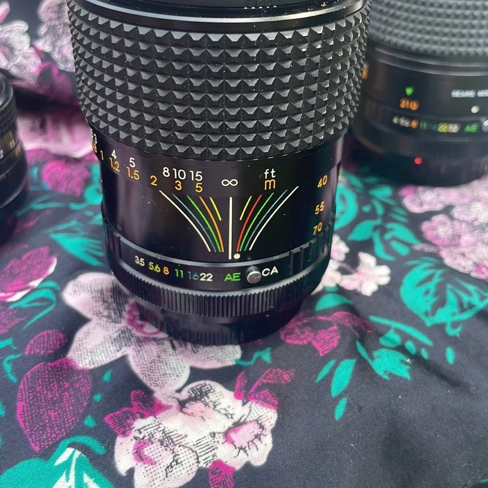 Canon ae 1 program camera with lenses and other accessories